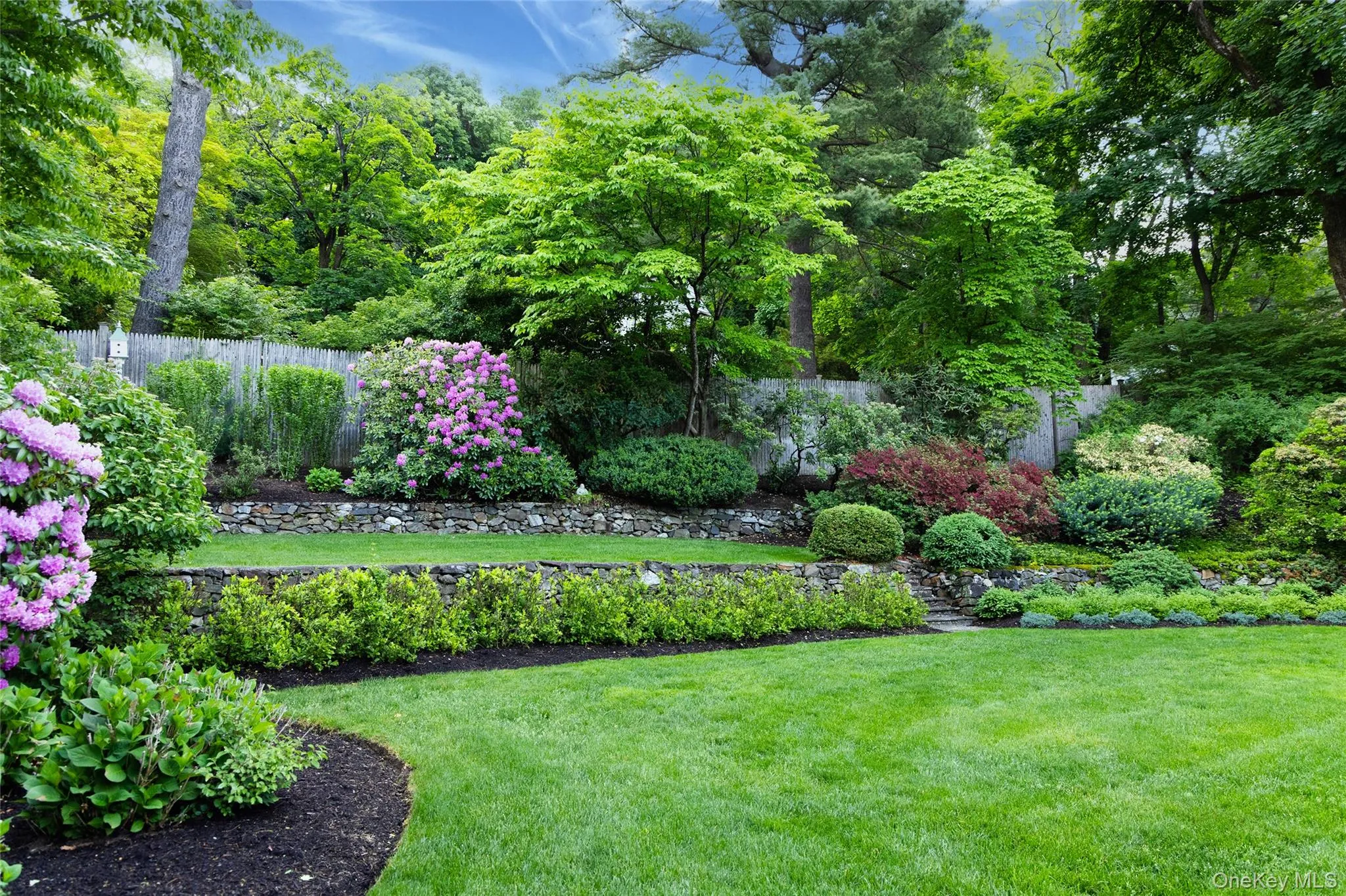 .50 acres of beautifully landscaped grounds .50 acres of beautifully landscaped grounds