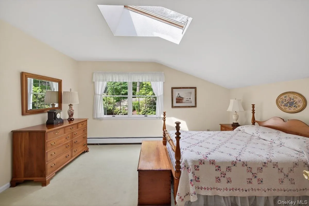 Guest bedroom with pleasant views and deep closet Guest bedroom with pleasant views and deep closet
