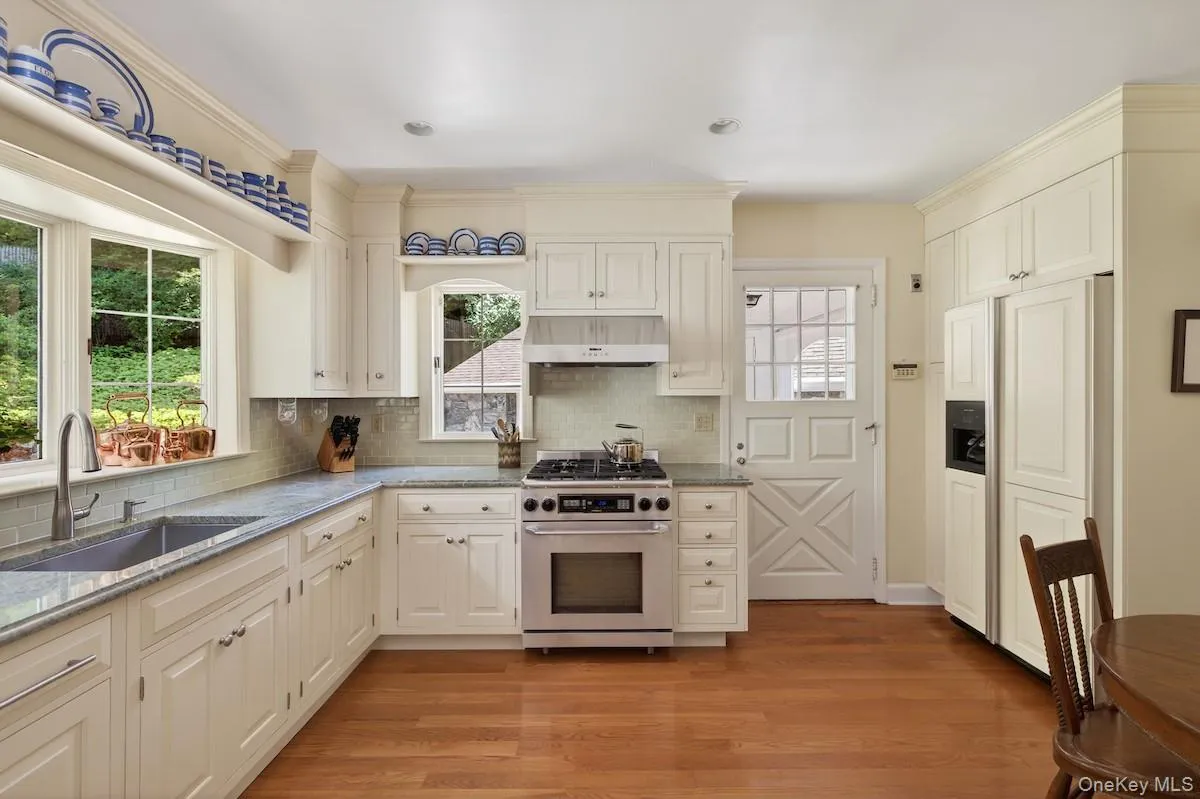 Eat-in kitchen with granite counters and stainless steel appliances Eat-in kitchen with granite counters and stainless steel appliances