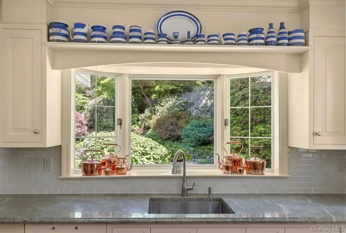 Second bay window from kitchen provides further landscape enjoyment Second bay window from kitchen provides further landscape enjoyment