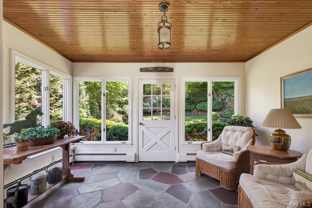 Sun room with wall-to-wall windows Sun room with wall-to-wall windows
