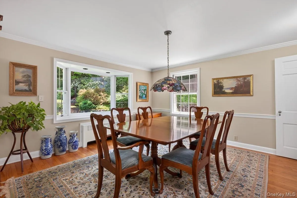 Dining room with prominent picture bay window Dining room with prominent picture bay window