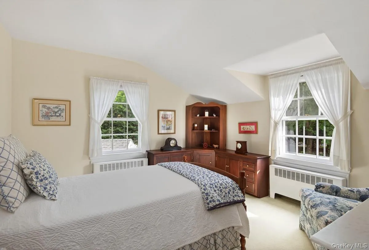 Generously proportioned bedroom with pleasant views and deep closet Generously proportioned bedroom with pleasant views and deep closet