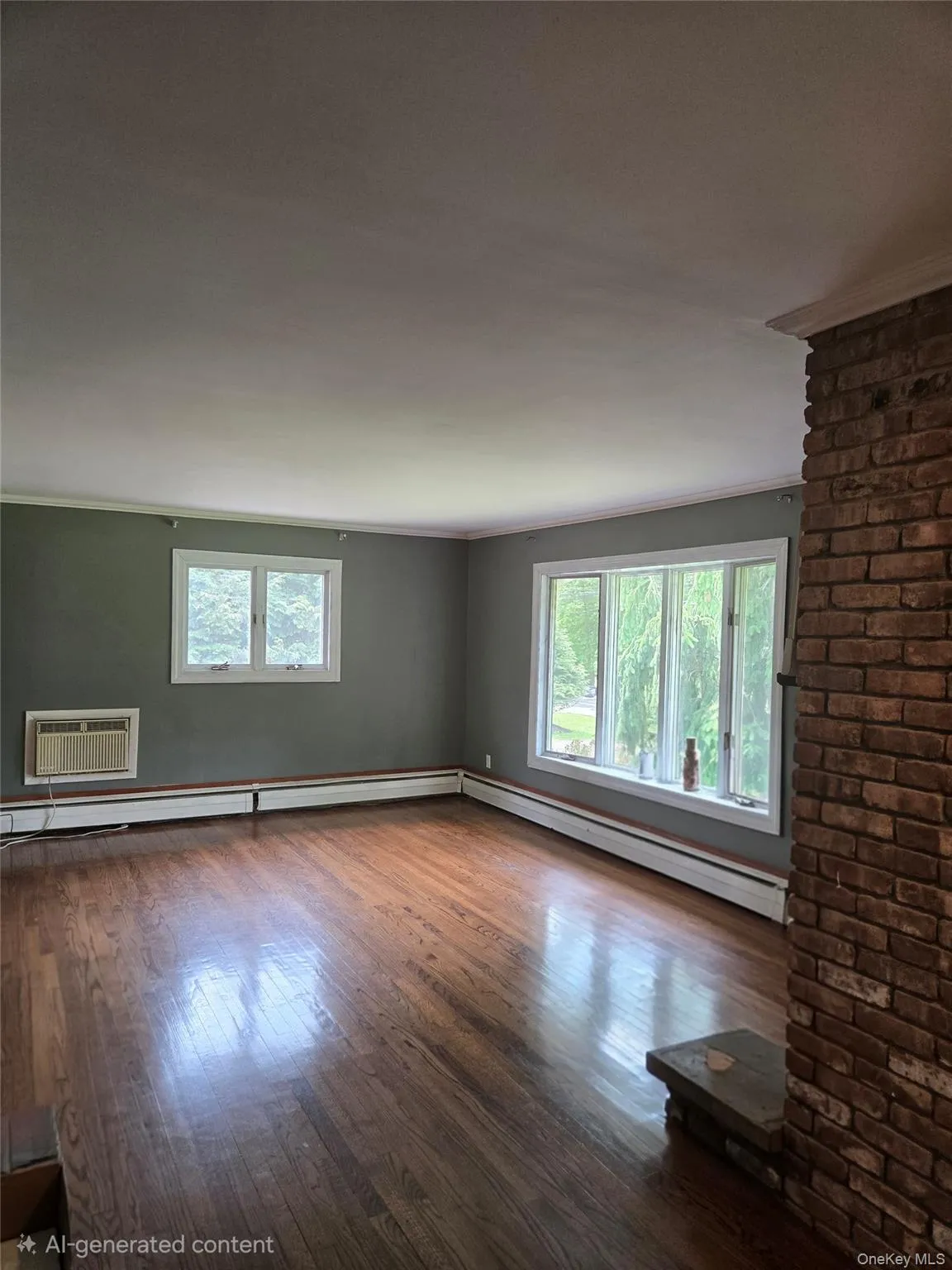 Large living room with working brick fireplace beautifully maintained hard wood floors Large living room with working brick fireplace beautifully maintained hard wood floors