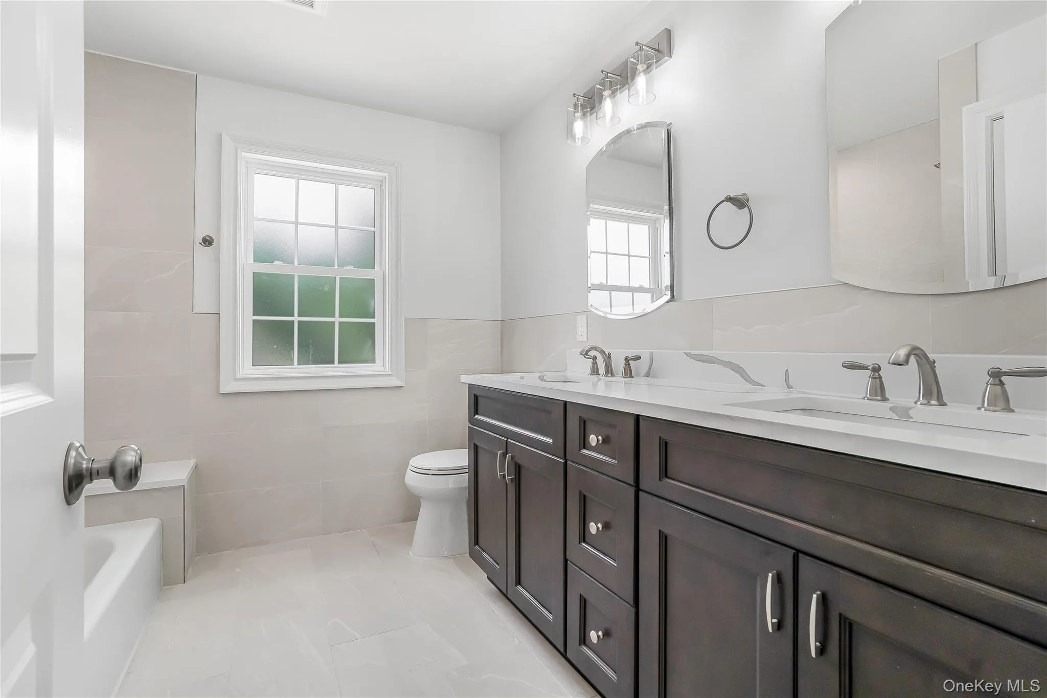 The main bathroom includes a double vanity with mirrored medicine cabinets, great for storing your every day needs. The main bathroom includes a double vanity with mirrored medicine cabinets, great for storing your every day needs.