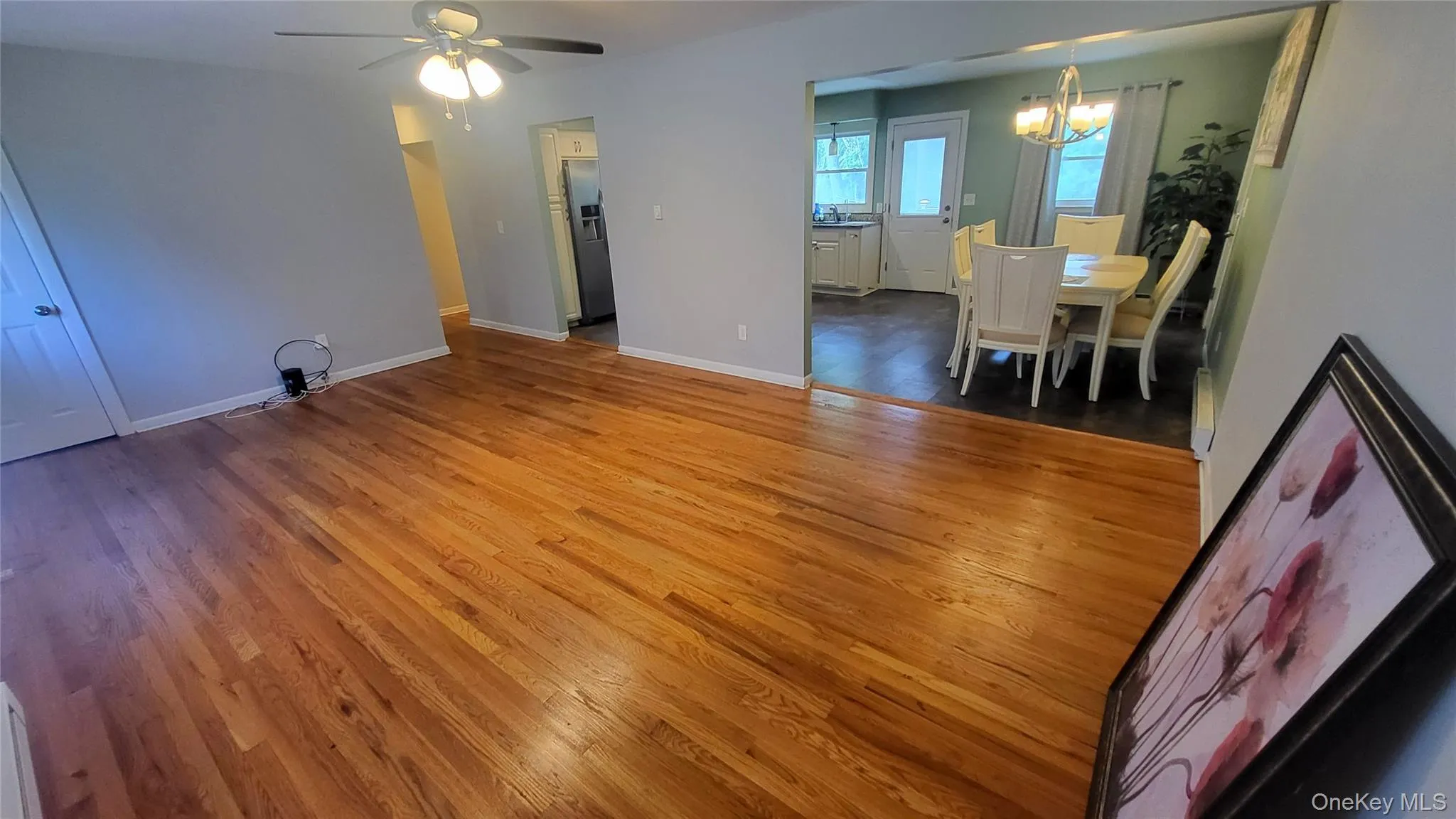 Open floor plan into dining area and kitchen Open floor plan into dining area and kitchen
