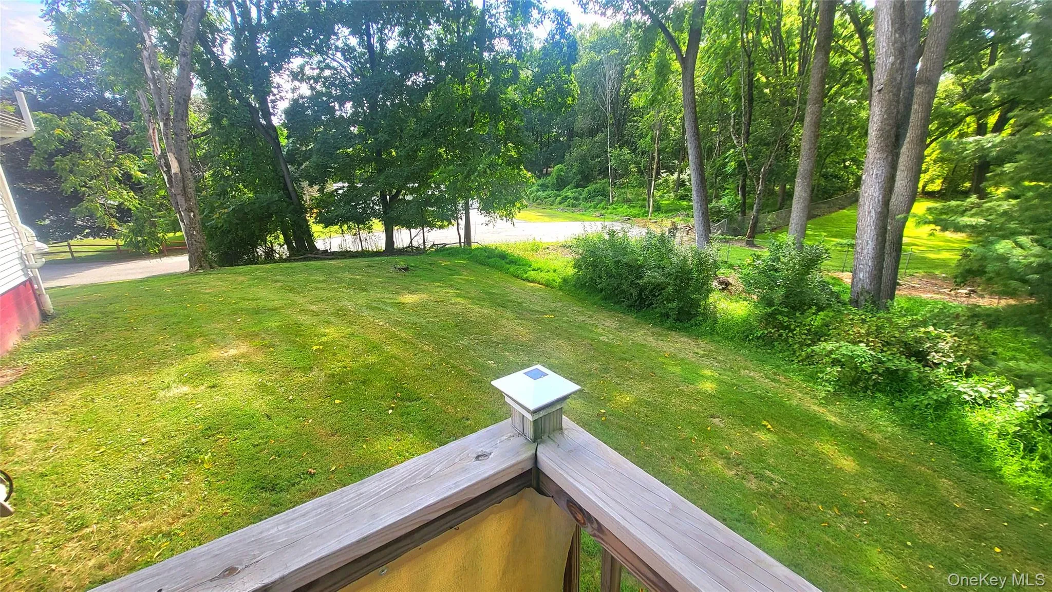 Deck view of grassy yard Deck view of grassy yard