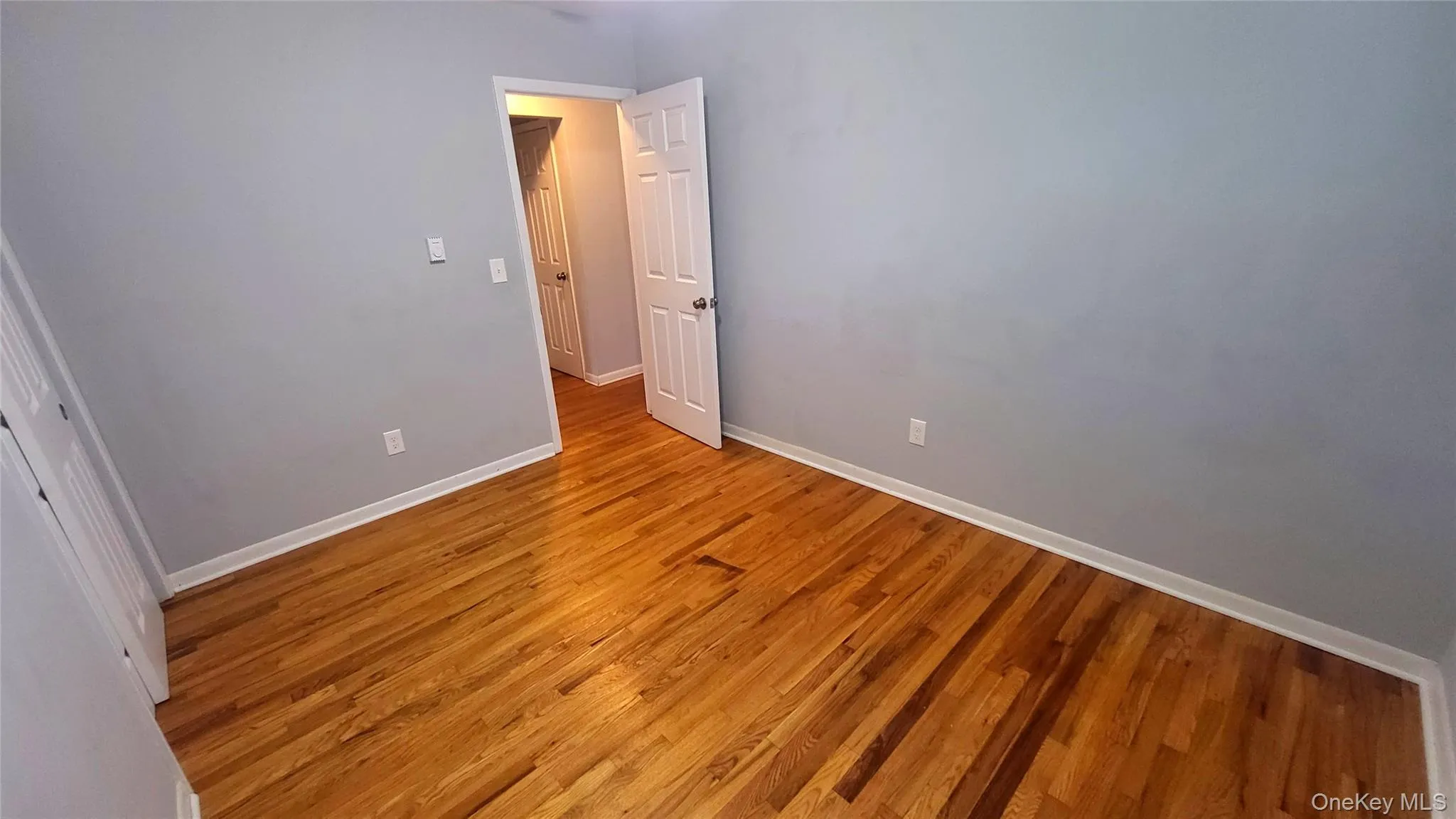 Bedroom 2 with hardwood floors Bedroom 2 with hardwood floors