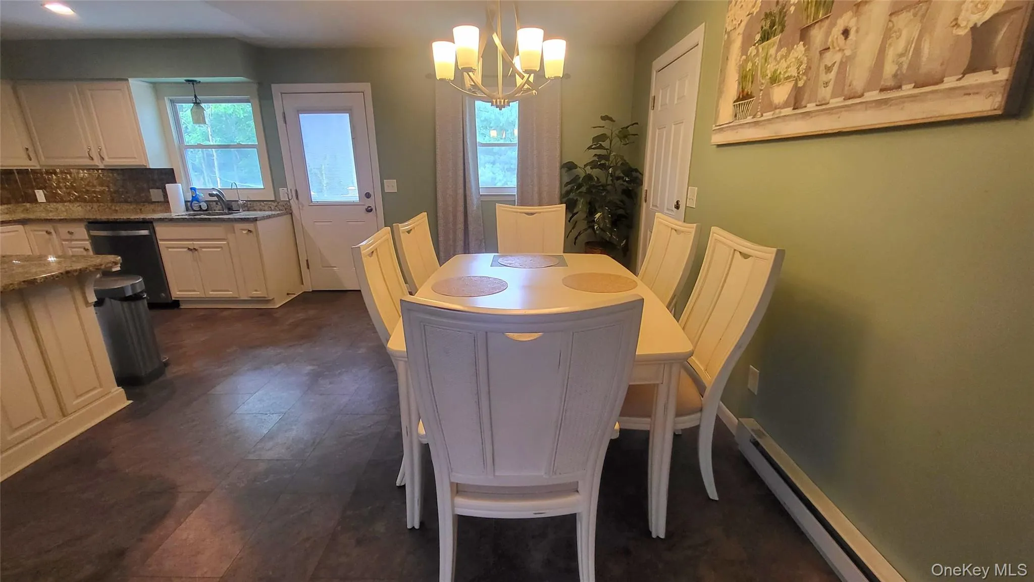 Dining room with chandelier Dining room with chandelier
