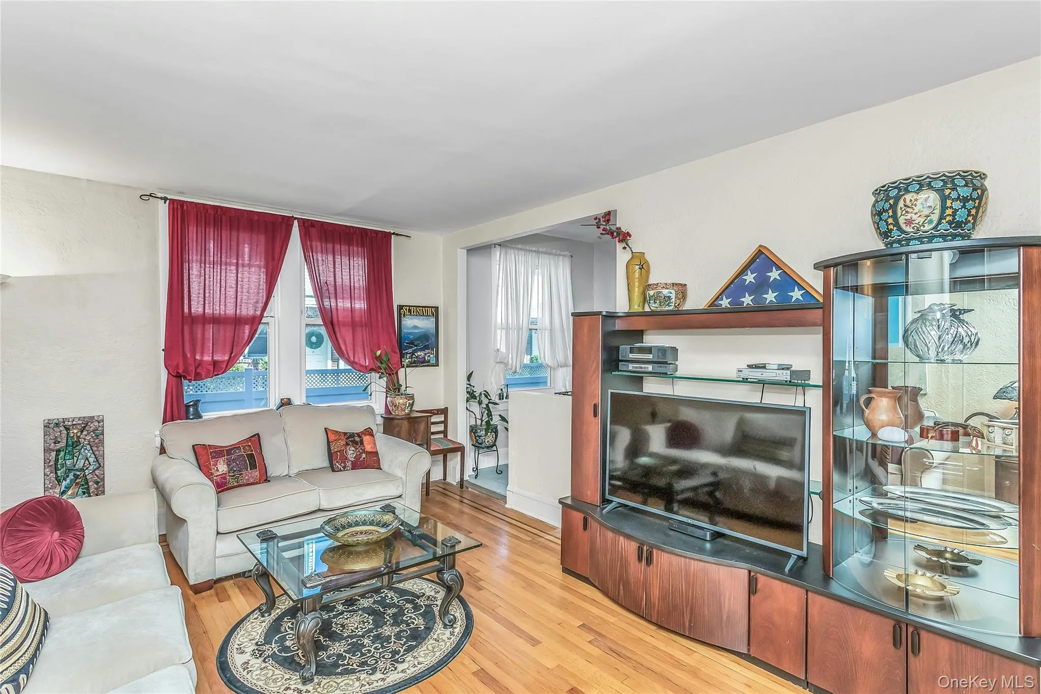 Spacious Living Room with large windows perfect for relaxing and entertaining Spacious Living Room with large windows perfect for relaxing and entertaining