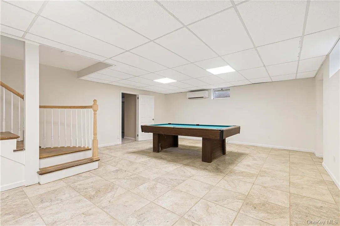 Finished basement w/ pool table Finished basement w/ pool table