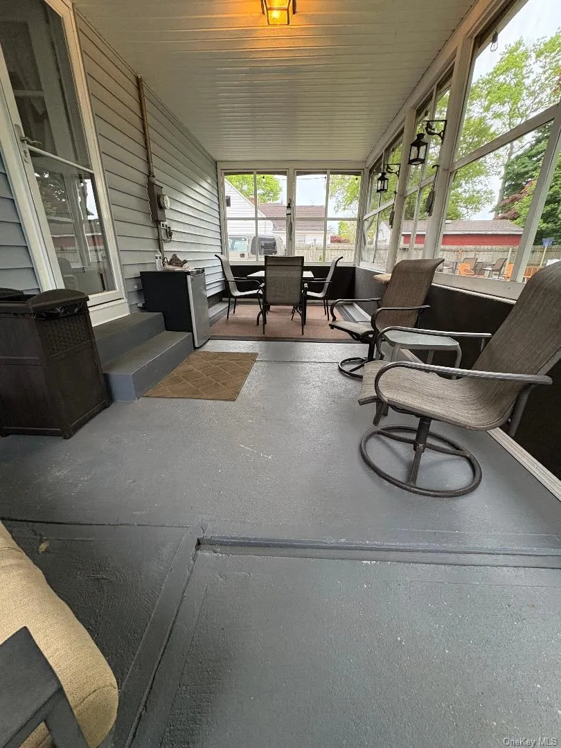 Enclosed back porch Enclosed back porch