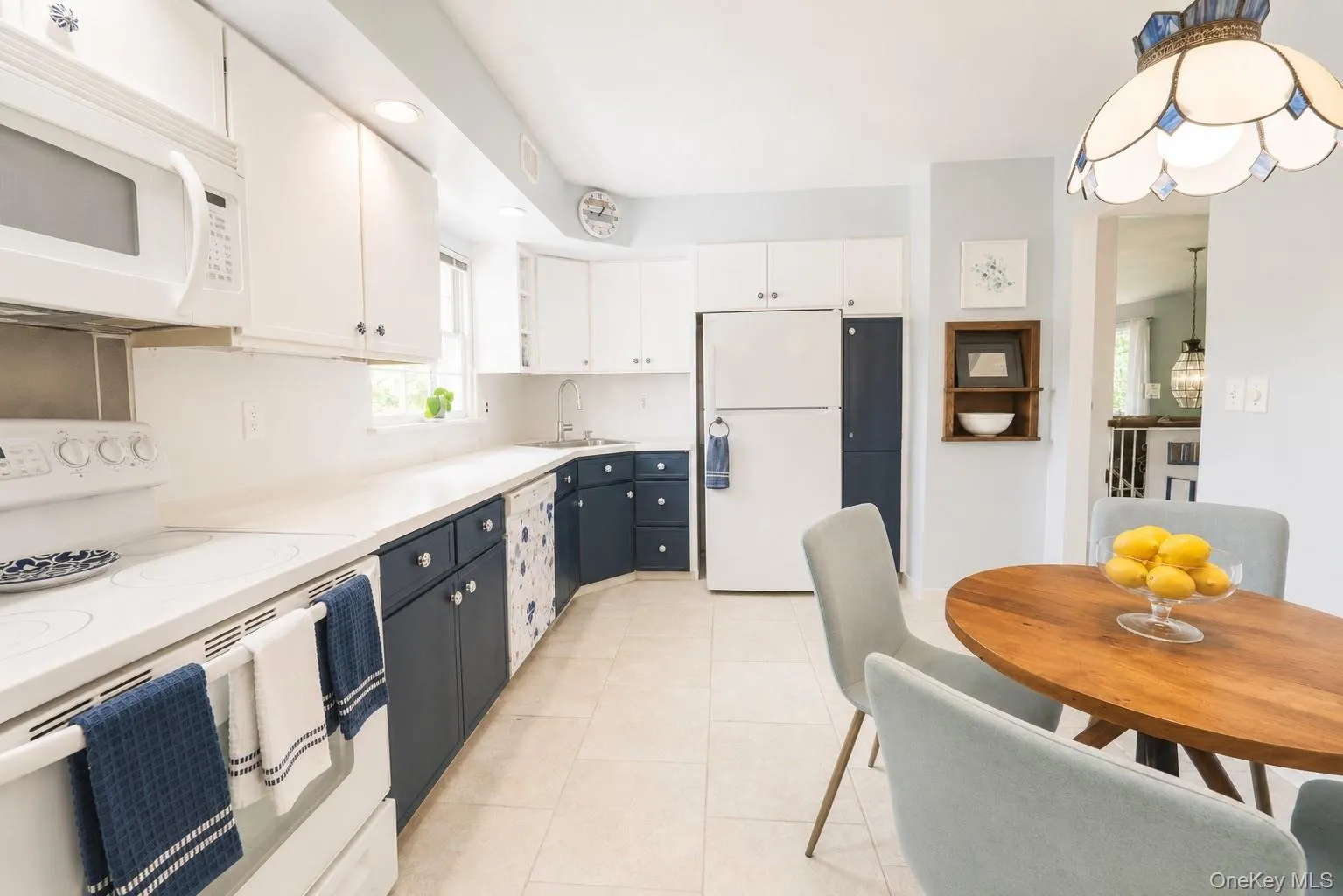 Another look at this functional kitchen featuring plenty of storage and charming built-in shelving to keep everything organized. Another look at this functional kitchen featuring plenty of storage and charming built-in shelving to keep everything organized.