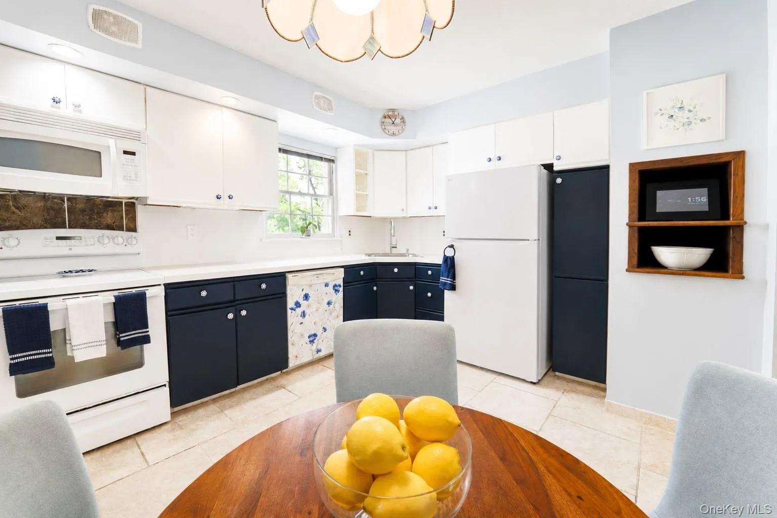 The walk-through kitchen offers easy access to the dining room and features ample counter space for everyday cooking and entertaining. The walk-through kitchen offers easy access to the dining room and features ample counter space for everyday cooking and entertaining.
