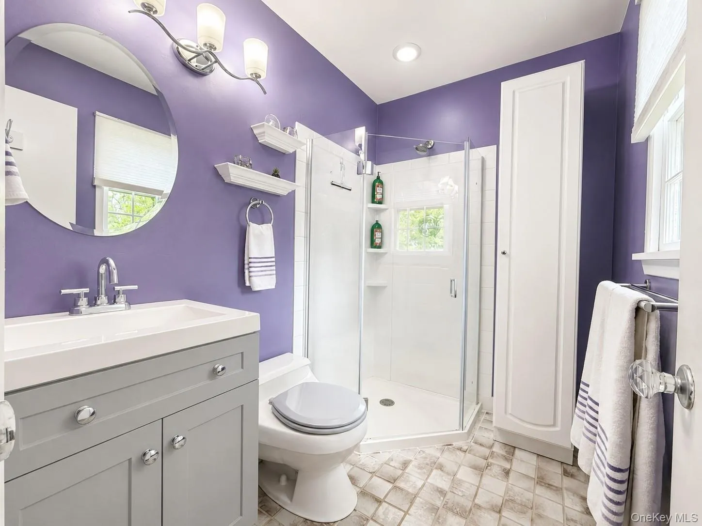 En-suite bath with corner shower. En-suite bath with corner shower.