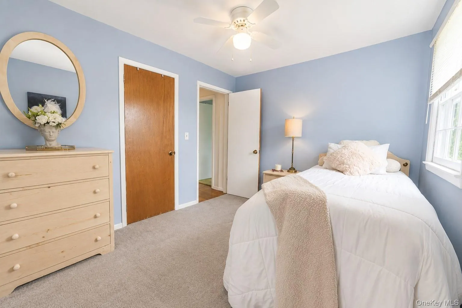 Another view of this secondary bedroom with ceiling fan/light combo. Another view of this secondary bedroom with ceiling fan/light combo.