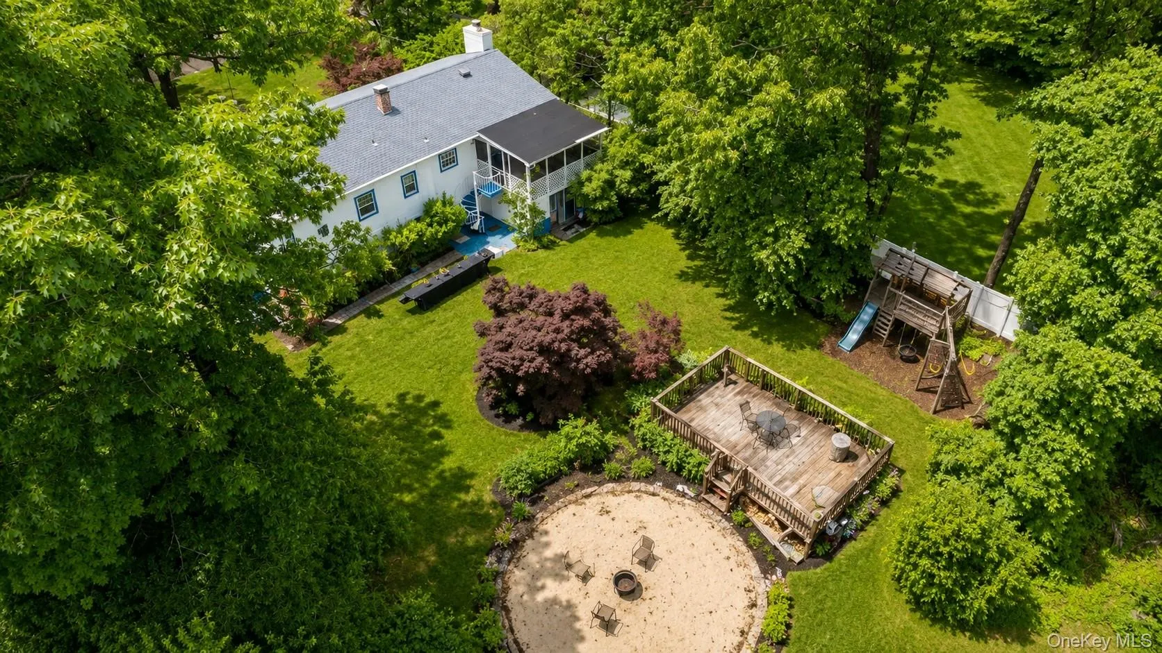 A stunning bird’s-eye view of your one-acre paradise, ready to be transformed into the backyard of your dreams. A stunning bird’s-eye view of your one-acre paradise, ready to be transformed into the backyard of your dreams.