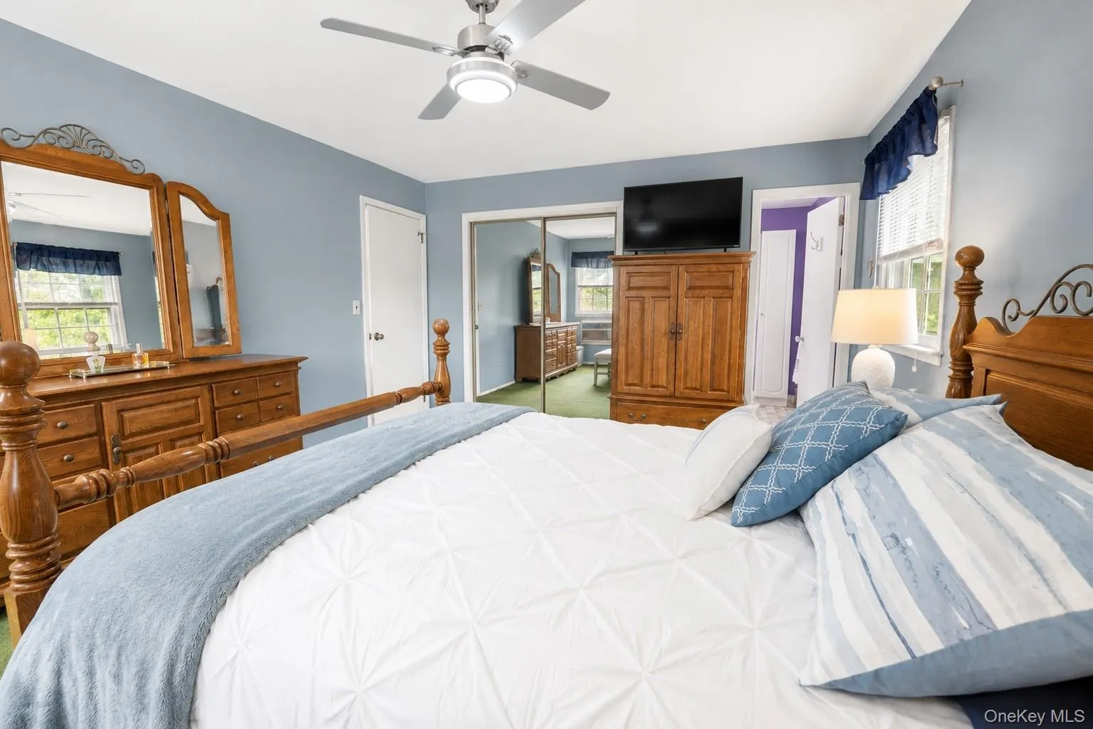 Primary bedroom complete with a ceiling fan and seamless access to the en-suite bath for added comfort and convenience. Primary bedroom complete with a ceiling fan and seamless access to the en-suite bath for added comfort and convenience.