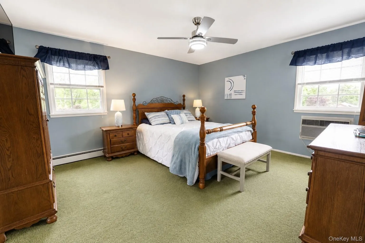 Comfortable primary bedroom with a spacious closet and double windows that fill the room with natural light. Comfortable primary bedroom with a spacious closet and double windows that fill the room with natural light.