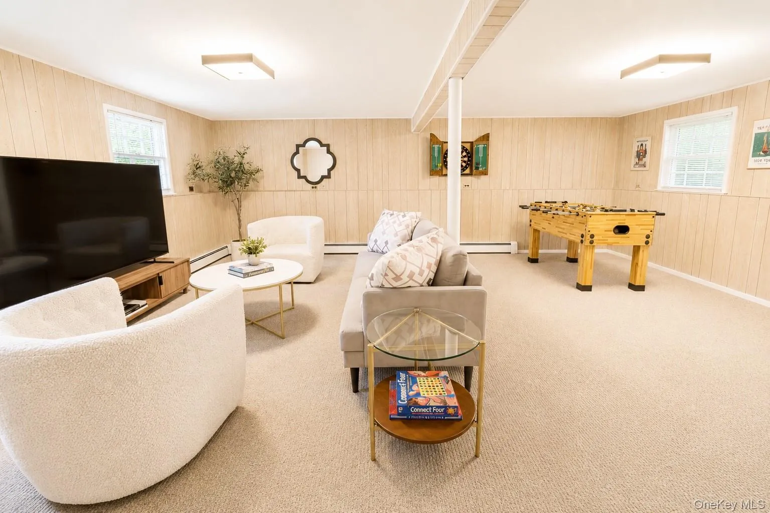 With its generous layout, this family room provides plenty of space to design functional areas such as a TV zone, play area, and lounge or bar space. With its generous layout, this family room provides plenty of space to design functional areas such as a TV zone, play area, and lounge or bar space.