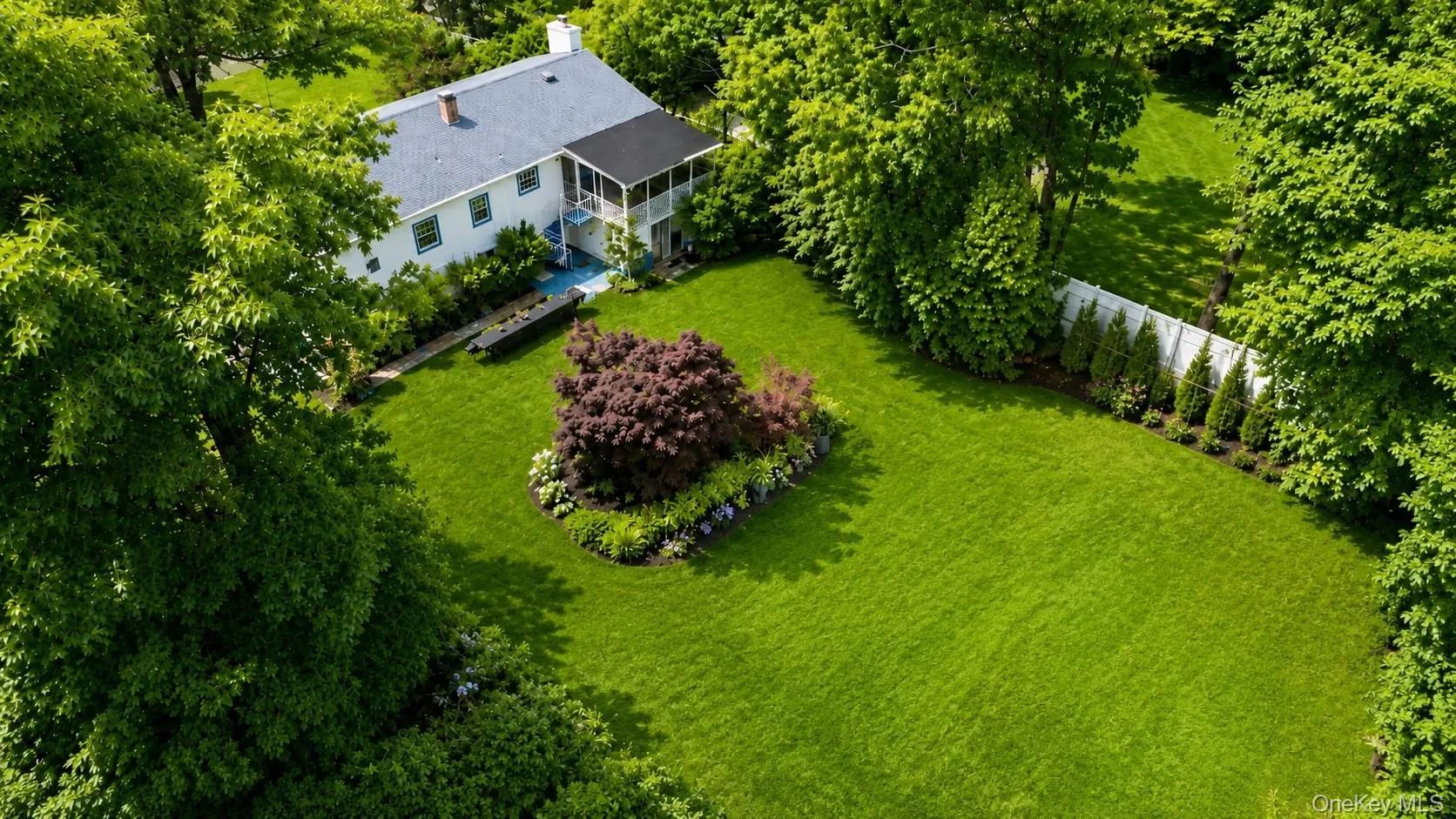 A digitally staged backyard filled with open green space, ideal for children and dogs to enjoy outdoor play. A digitally staged backyard filled with open green space, ideal for children and dogs to enjoy outdoor play.