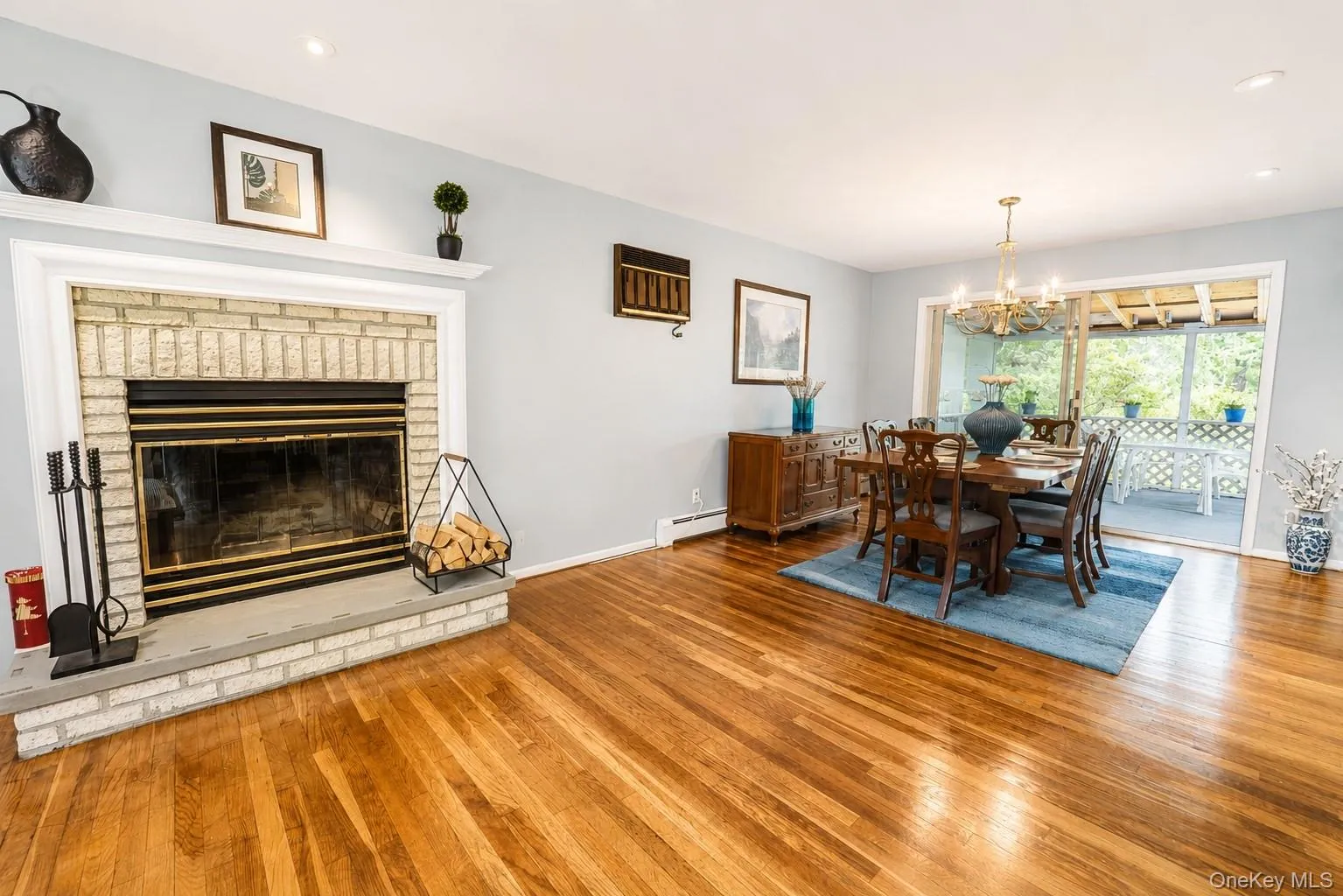 The living room flows seamlessly into the dining area with convenient access to the porch, perfect for indoor-outdoor living. The living room flows seamlessly into the dining area with convenient access to the porch, perfect for indoor-outdoor living.
