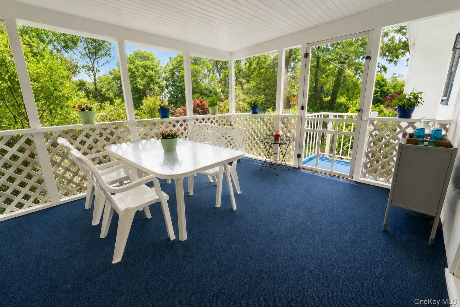 The porch-sunroom you’ve been dreaming of, offering the perfect space to breathe in fresh air, relax, and enjoy a glass of wine while unwinding. The porch-sunroom you’ve been dreaming of, offering the perfect space to breathe in fresh air, relax, and enjoy a glass of wine while unwinding.