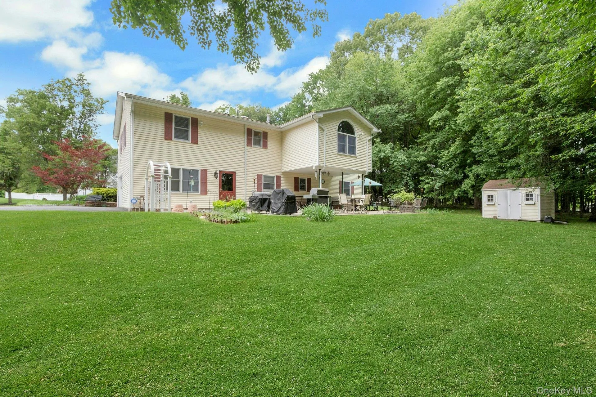 Back of house and yard, expansive, level, private Back of house and yard, expansive, level, private