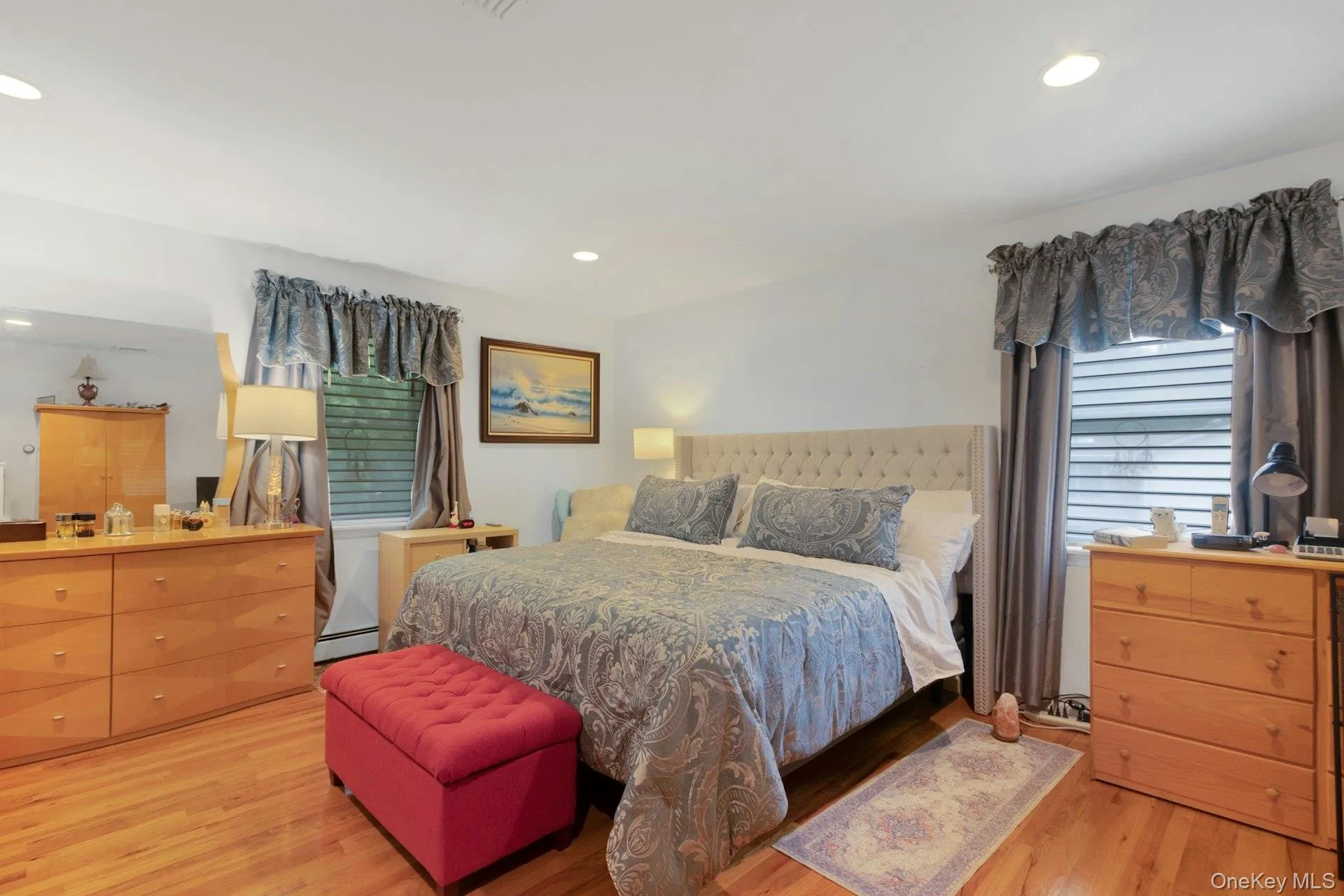 Primary bedroom with hardwood floors, recessed lighting, walk-in closet and luxury spa-like ensuite barthroom Primary bedroom with hardwood floors, recessed lighting, walk-in closet and luxury spa-like ensuite barthroom