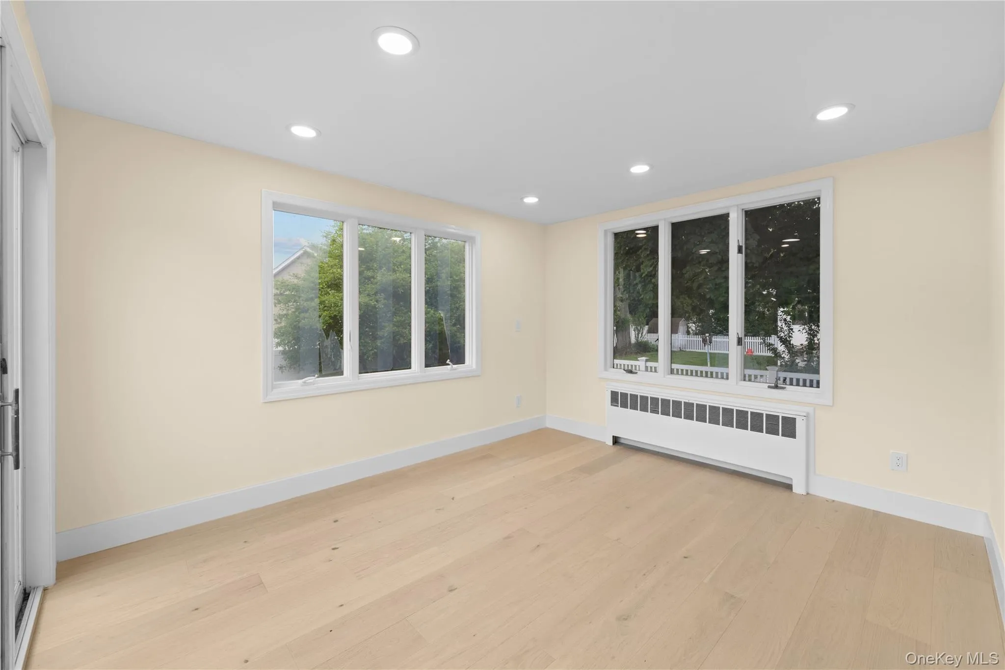 DEN WITH SLIDING GLASS DOORS TO THE BACKYARD DEN WITH SLIDING GLASS DOORS TO THE BACKYARD