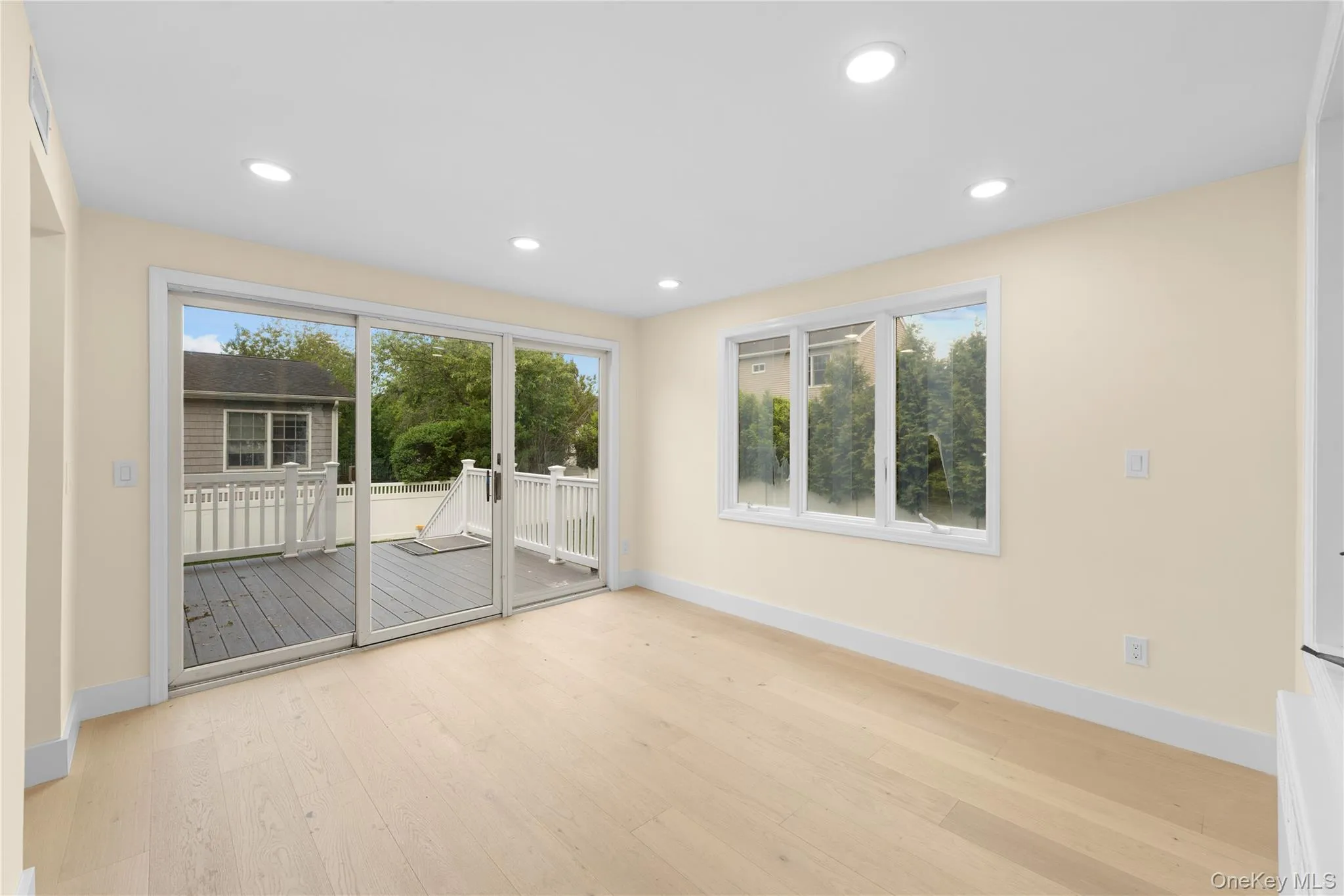 DEN WITH SLIDING GLASS DOORS TO THE BACKYARD DEN WITH SLIDING GLASS DOORS TO THE BACKYARD