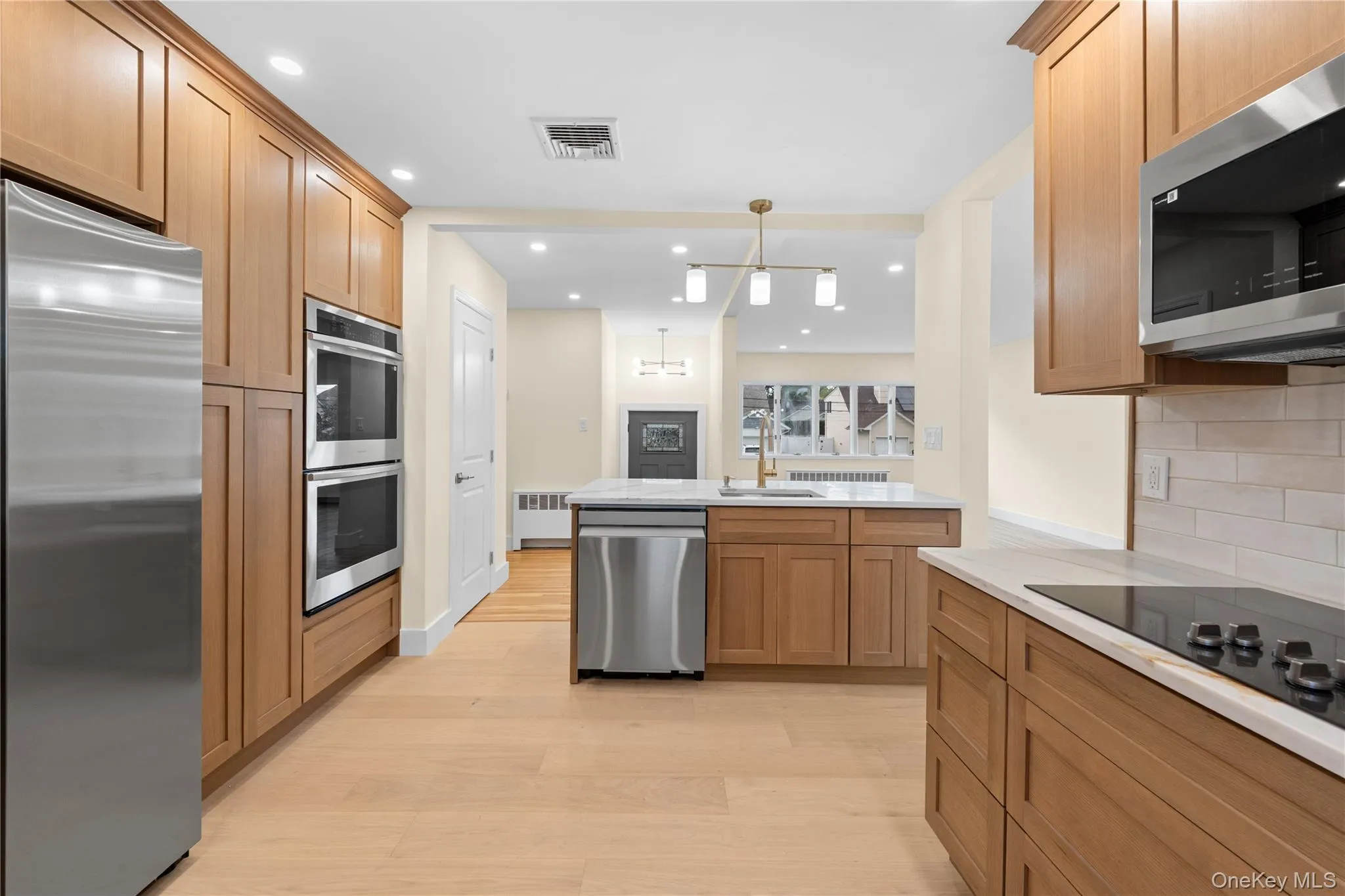 OPEN CONCEPT KITCHEN WITH ENGINEERED WOOD FLOORS OPEN CONCEPT KITCHEN WITH ENGINEERED WOOD FLOORS