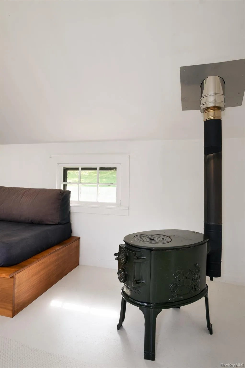 Vintage working wood stove in the guest cottage Vintage working wood stove in the guest cottage
