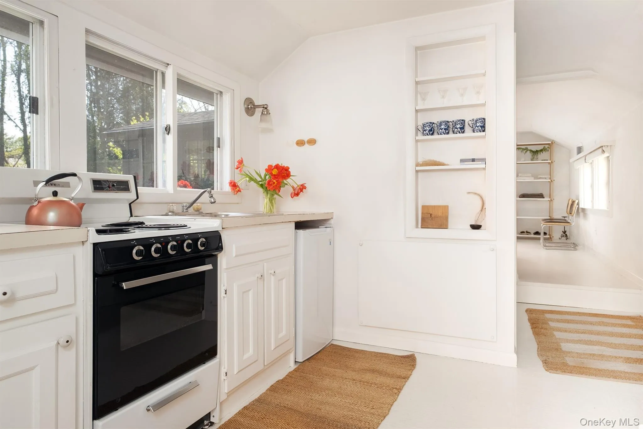 Cheerful, windowed guest cottage kitchen Cheerful, windowed guest cottage kitchen