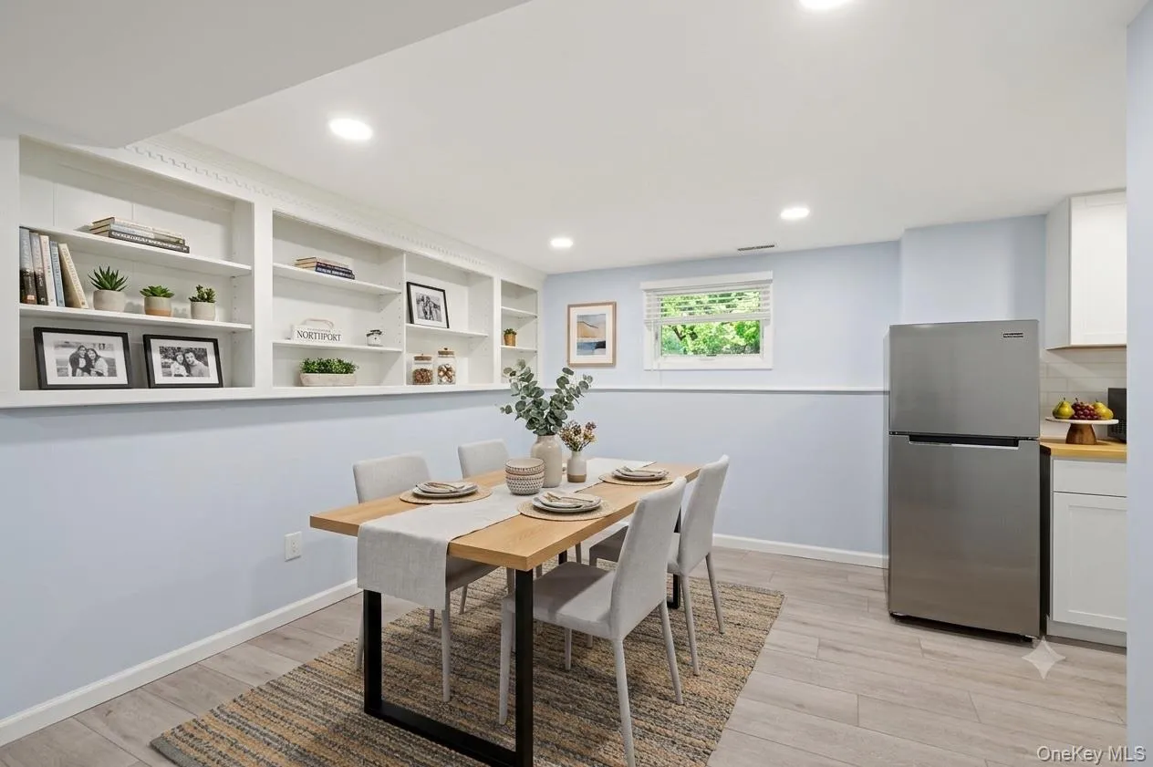 Virtually staged lower level dining room Virtually staged lower level dining room