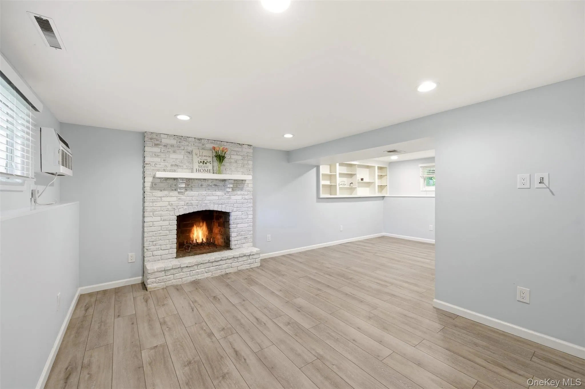 Lower level living room, wood burning fireplace Lower level living room, wood burning fireplace