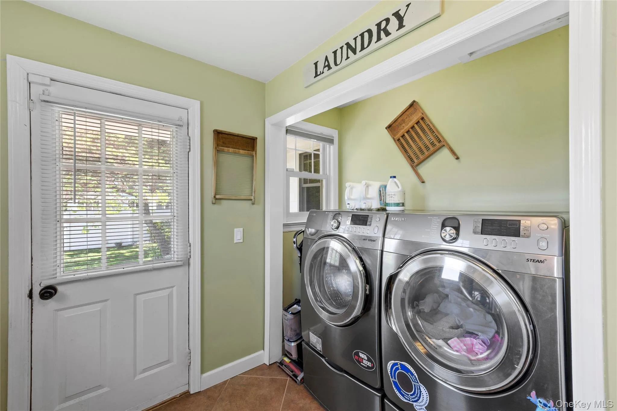 Laundry located in the mud room Laundry located in the mud room