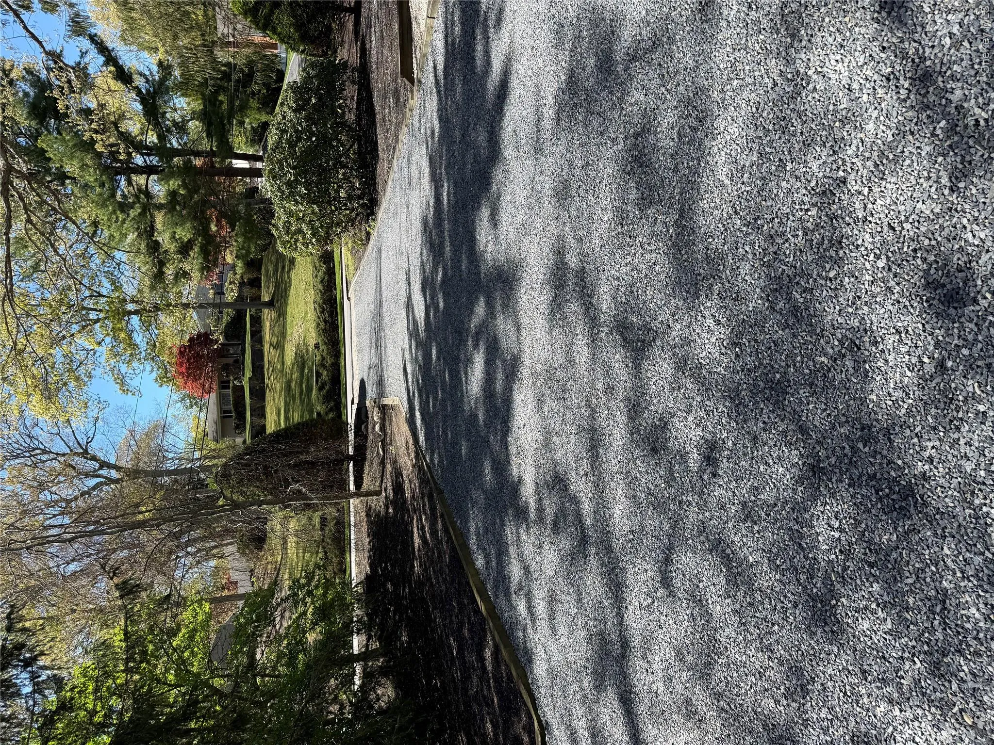 Driveway entry and parking area Driveway entry and parking area
