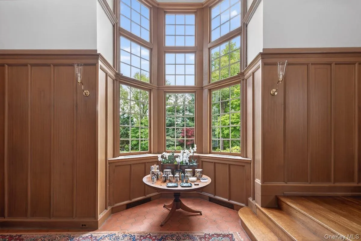The beauty of the original details in the entry stair hall sets the tone of gracious living throughout the home The beauty of the original details in the entry stair hall sets the tone of gracious living throughout the home