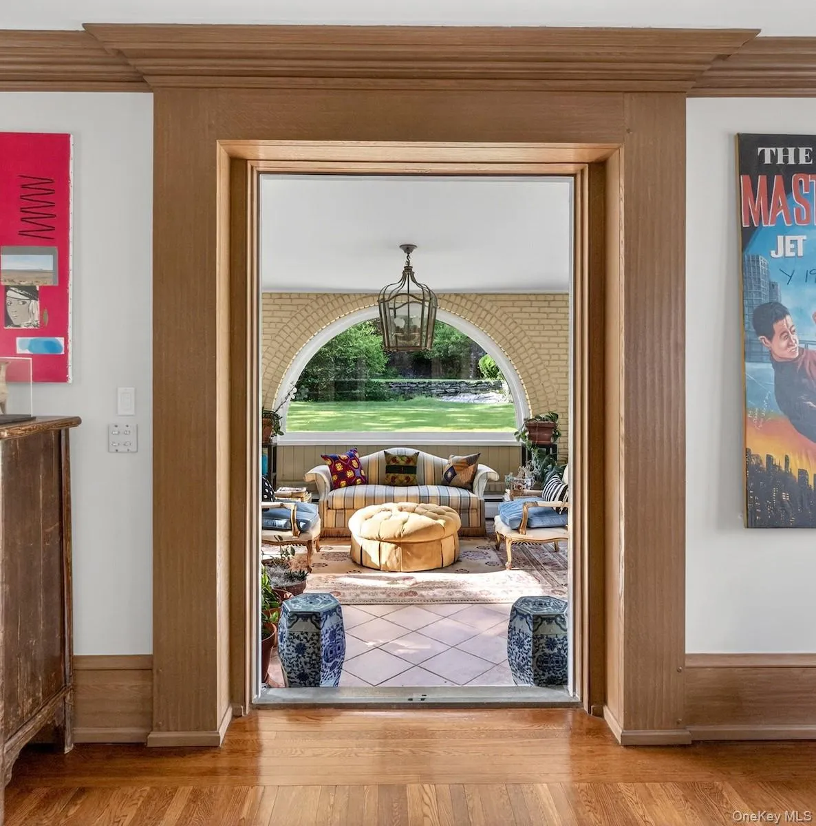 Enter the wondrous sun room through pocket doors from the living room Enter the wondrous sun room through pocket doors from the living room