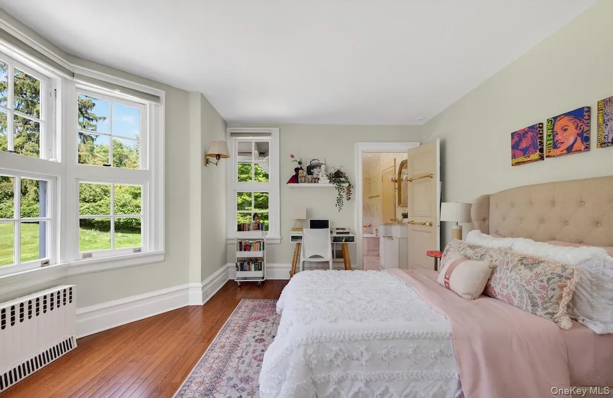 bedroom with door to adjoining bathroom bedroom with door to adjoining bathroom