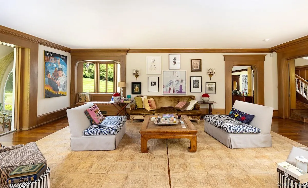 Living room leads to library as well as sunroom Living room leads to library as well as sunroom