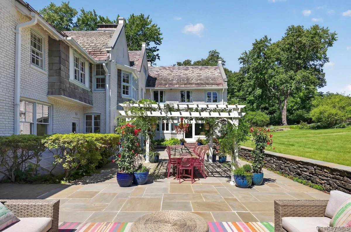 Expansive rear terrace is large enough for multiple seating areas Expansive rear terrace is large enough for multiple seating areas