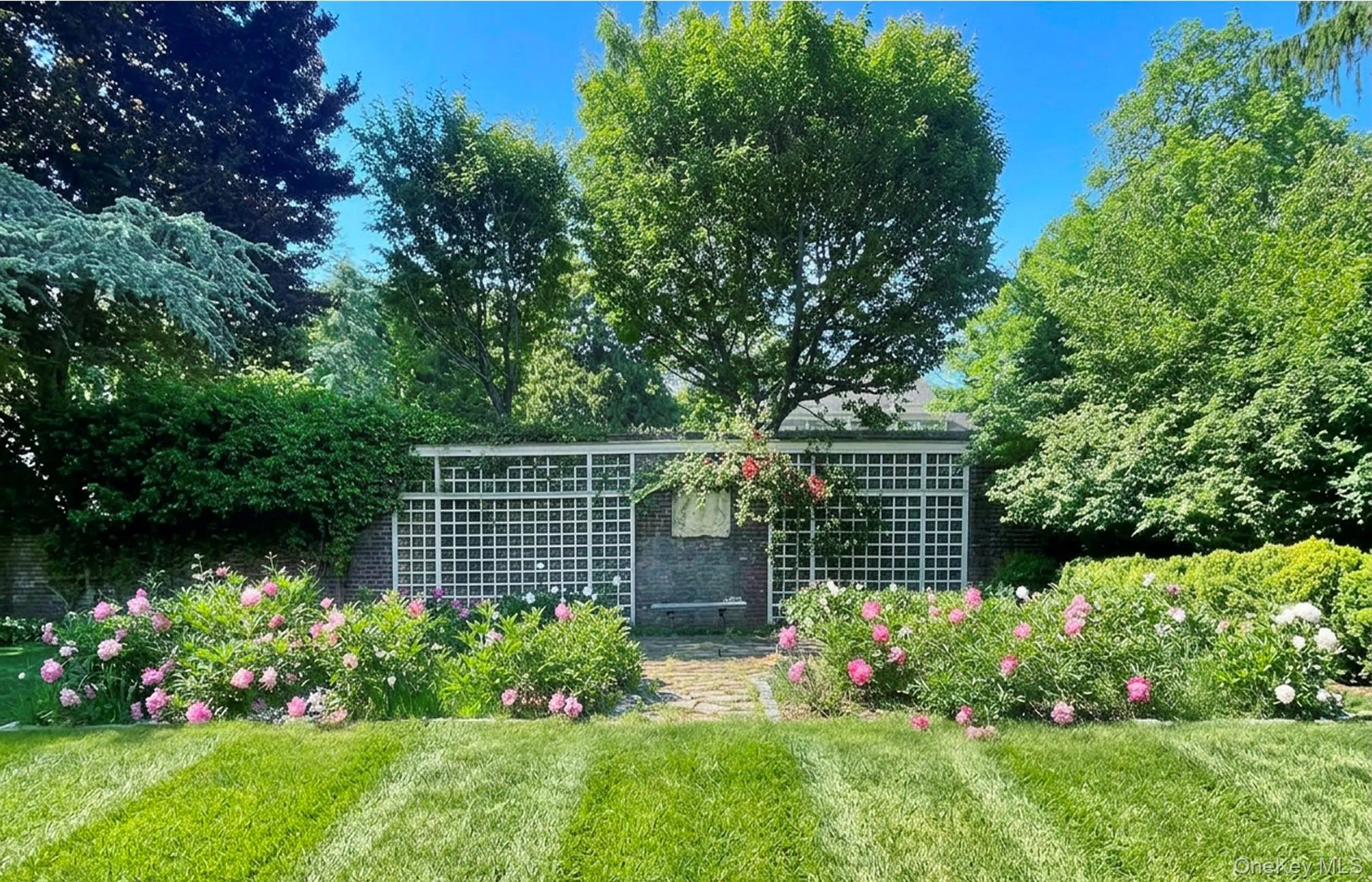 Picturesque back lawn flower garden Picturesque back lawn flower garden