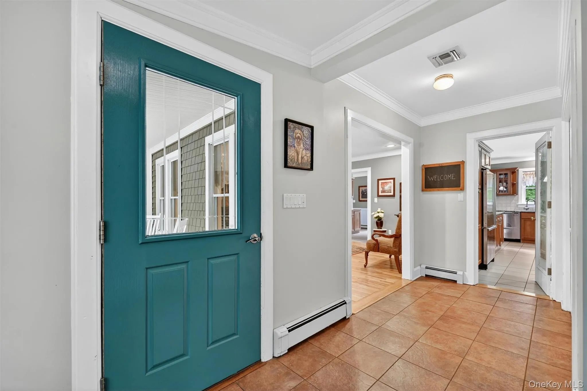 Tile flooring, crisp white trim, and a seamless flow into the main living areas and kitchen Tile flooring, crisp white trim, and a seamless flow into the main living areas and kitchen