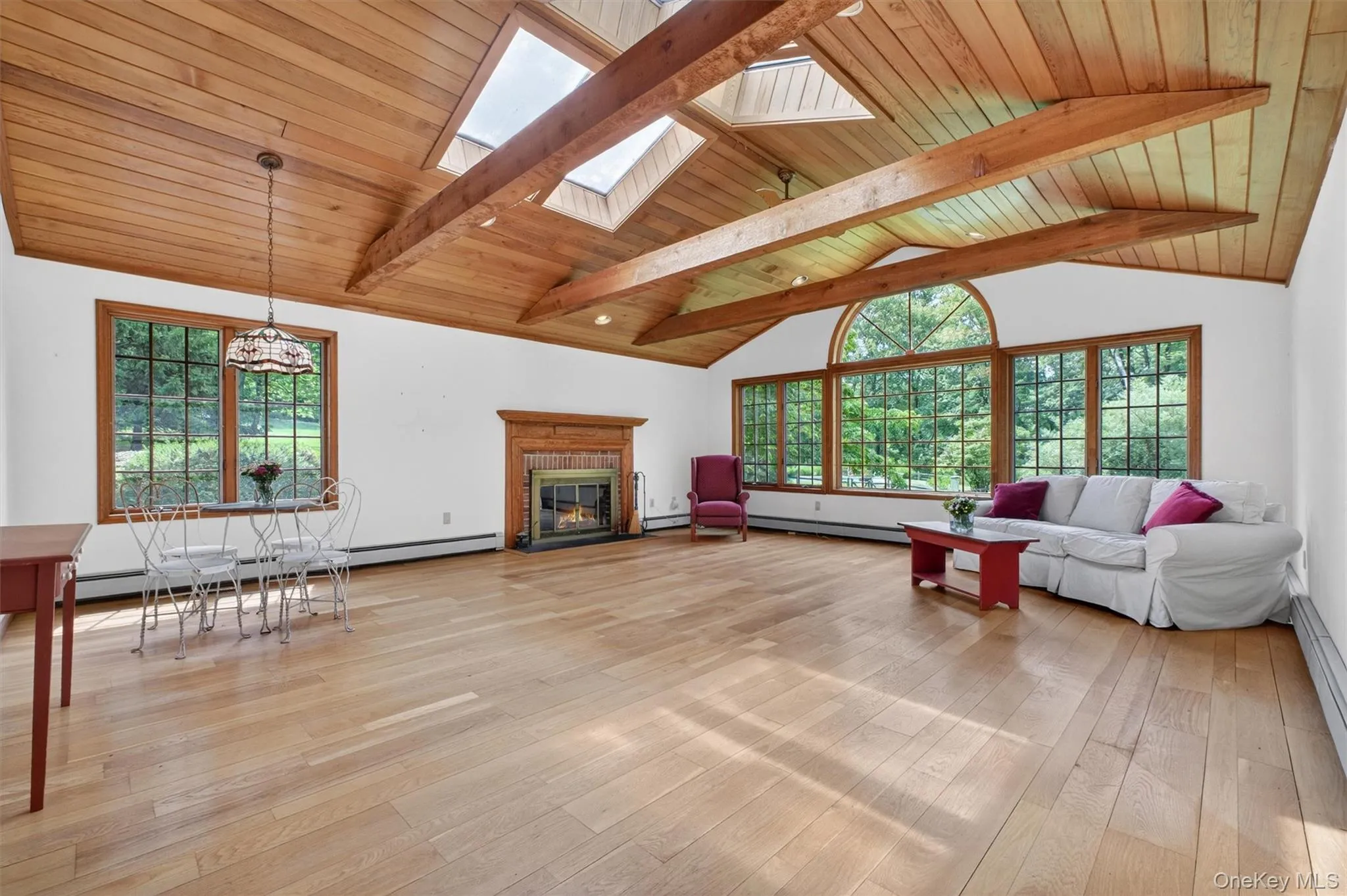 Magnificent Great Room/Family Room with Skylights, Wood Ceiling & Beams, Tons of Windows, FP & Slider to Screened in Porch Magnificent Great Room/Family Room with Skylights, Wood Ceiling & Beams, Tons of Windows, FP & Slider to Screened in Porch