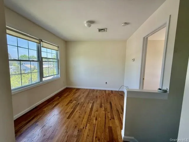 2nd Floor Sitting Space. Small sitting area located at top of staircase. 2nd Floor Sitting Space. Small sitting area located at top of staircase.