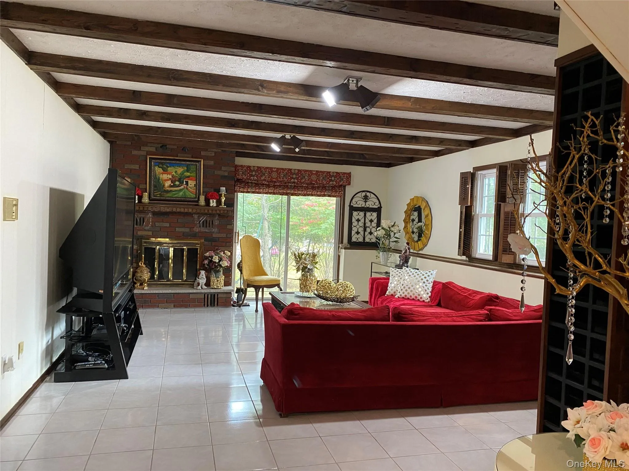 Lower level family room features woodturning fireplace Lower level family room features woodturning fireplace