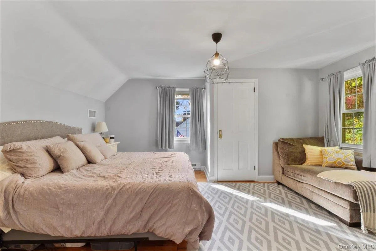 The upstairs primary bedroom has two deep closets and space to relax. The upstairs primary bedroom has two deep closets and space to relax.