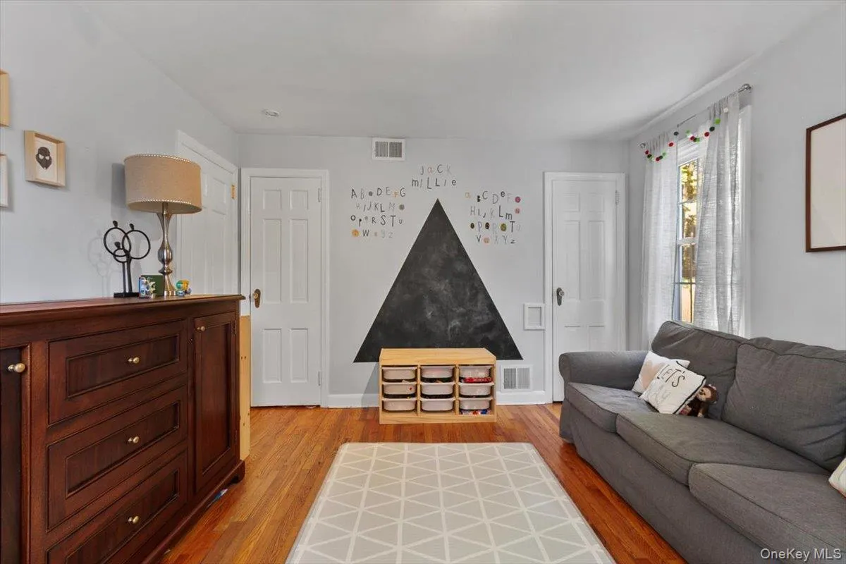 There are four bedrooms in the home. This one is currently being used as a playroom. There are four bedrooms in the home. This one is currently being used as a playroom.